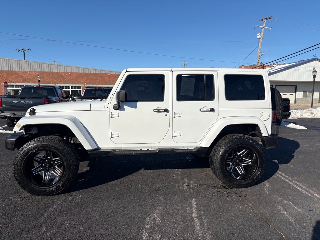 Used 2015 Jeep Wrangler Unlimited Sahara with VIN 1C4BJWEG0FL589363 for sale in Fairfield, IL