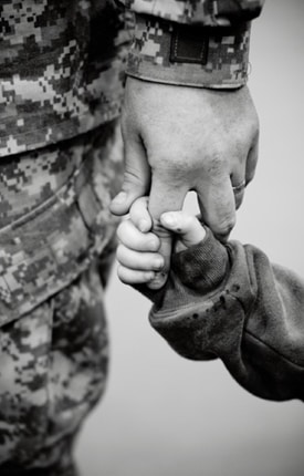 Honoring the fallen by lifting their children up.