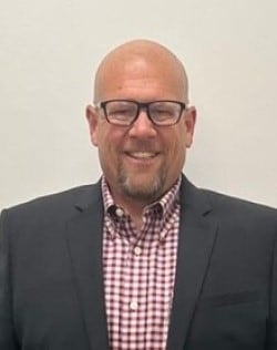Staff member Aaron Garrett from d55926bdbdb4