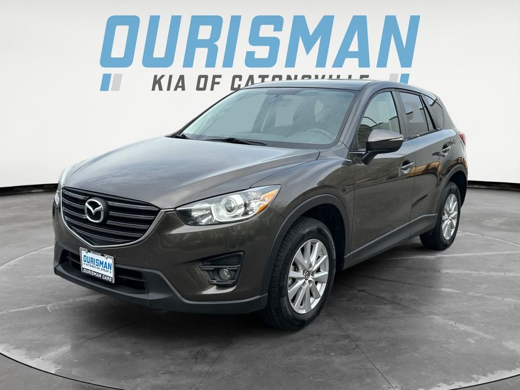 Used 2016 Mazda CX-5 Touring with VIN JM3KE2CY7G0741013 for sale in Woodlawn, MD