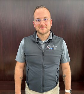 Staff member Adam Thompson from ID_6a6ac642eeb0