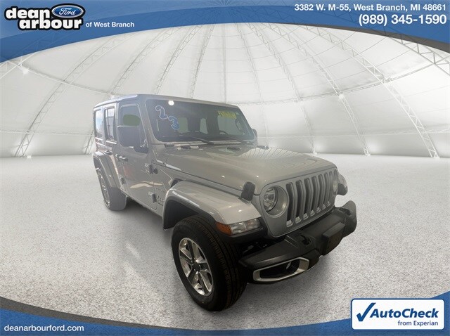 Used 2023 Jeep Wrangler 4-Door Sahara with VIN 1C4HJXEG6PW586838 for sale in West Branch, MI