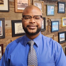 Staff member Courtney Poke from 66b2877bc4e7