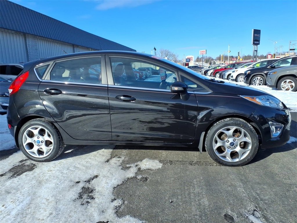 Used 2011 Ford Fiesta SES with VIN 3FADP4FJ1BM105821 for sale in Monroe, WI