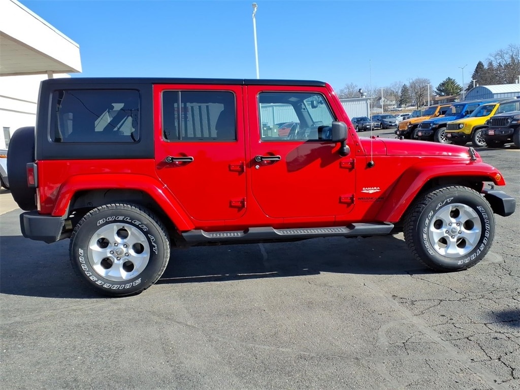 Used 2013 Jeep Wrangler Unlimited Sahara with VIN 1C4HJWEG1DL696638 for sale in Monroe, WI