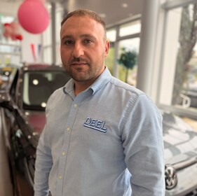 Staff member Andrei Caruntu from 361e04c243b7