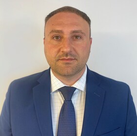 Staff member Andrei Caruntu from 361e04c243b7