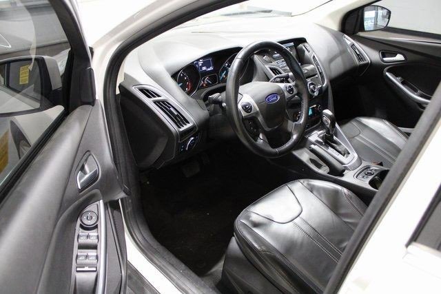 Used 2014 Ford Focus Titanium with VIN 1FADP3J22EL396927 for sale in Pleasant Hill, IA