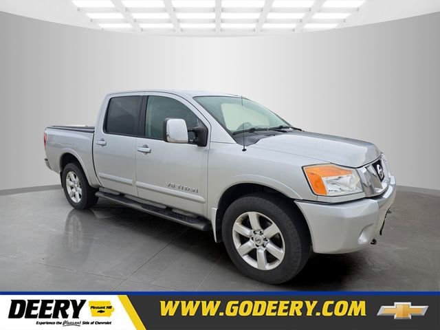 2010 Nissan Titan LE 4X4 Crew Cab SWB's photo