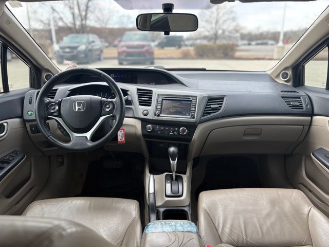 Used 2012 Honda Civic EX-L with VIN 2HGFB2F94CH518975 for sale in Iowa City, IA