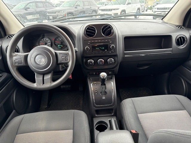 Used 2012 Jeep Compass Sport with VIN 1C4NJDBB7CD597170 for sale in Iowa City, IA