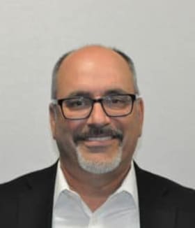 Staff member A. J. PEREZ from ID_55c177