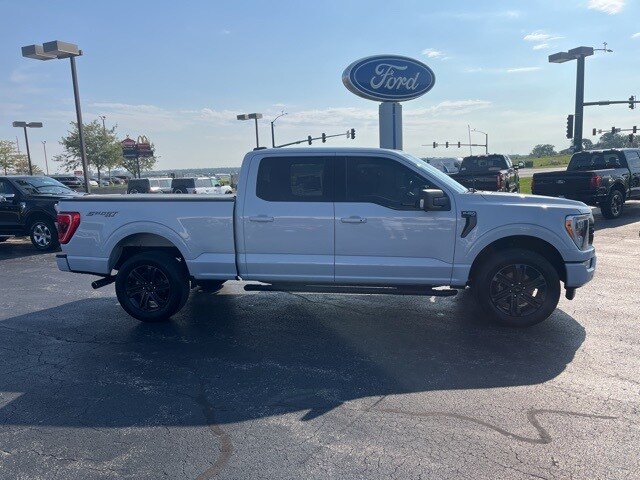 Used 2021 Ford F-150 XLT with VIN 1FTFW1E57MKF02260 for sale in Iowa City, IA