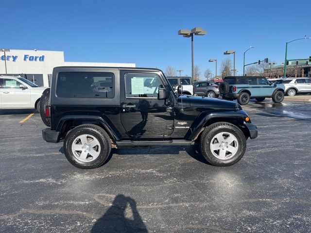 Used 2011 Jeep Wrangler Sahara with VIN 1J4AA5D11BL548716 for sale in Iowa City, IA