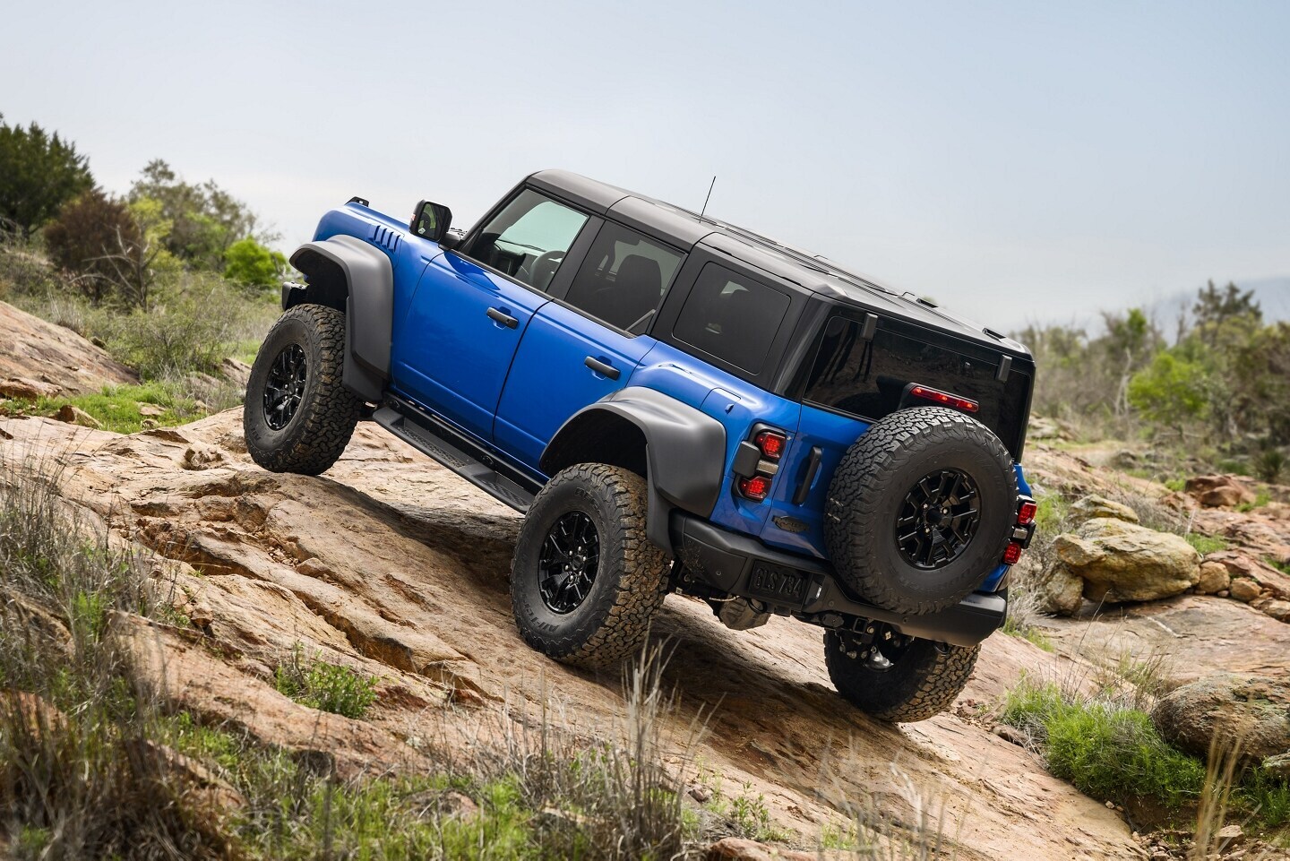 Ford Bronco driving on rocky terrain