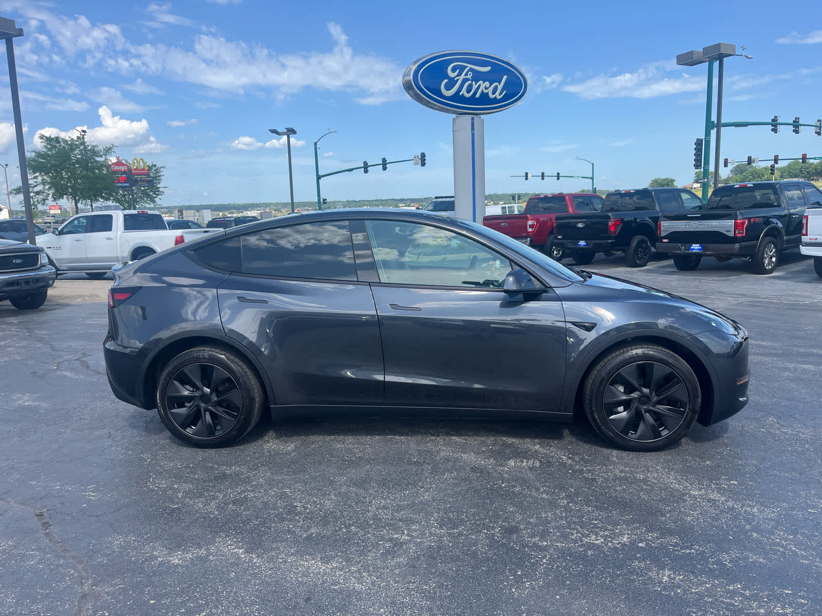 Used 2025 Tesla Model Y Long Range with VIN 7SAYGDEE5SF272173 for sale in Iowa City, IA