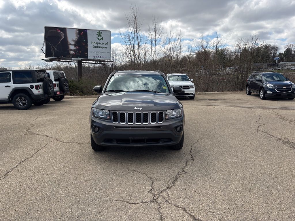Used 2016 Jeep Compass Sport with VIN 1C4NJDBB1GD630945 for sale in Dubuque, IA