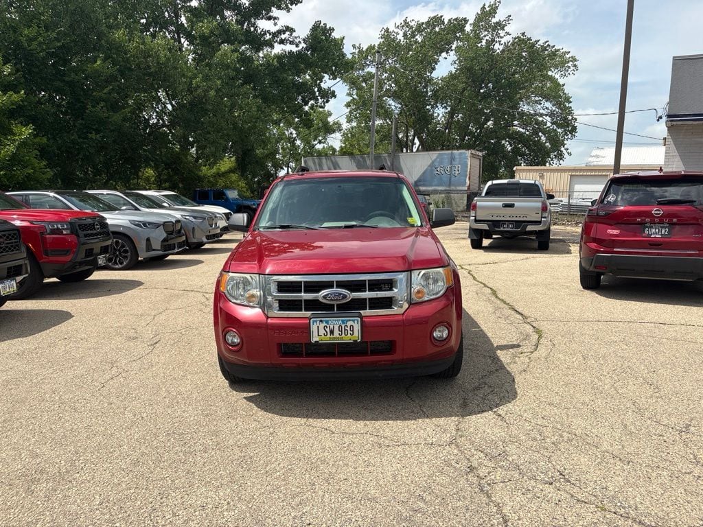 Used 2009 Ford Escape XLT with VIN 1FMCU93G99KB46926 for sale in Dubuque, IA