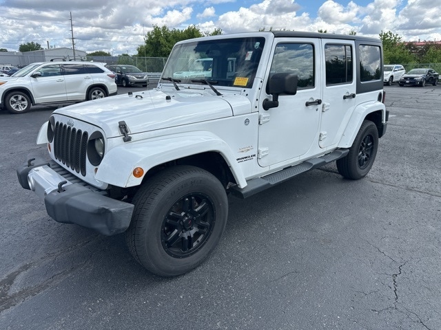 Used 2013 Jeep Wrangler Unlimited Sahara with VIN 1C4BJWEG9DL537680 for sale in Cedar Falls, IA