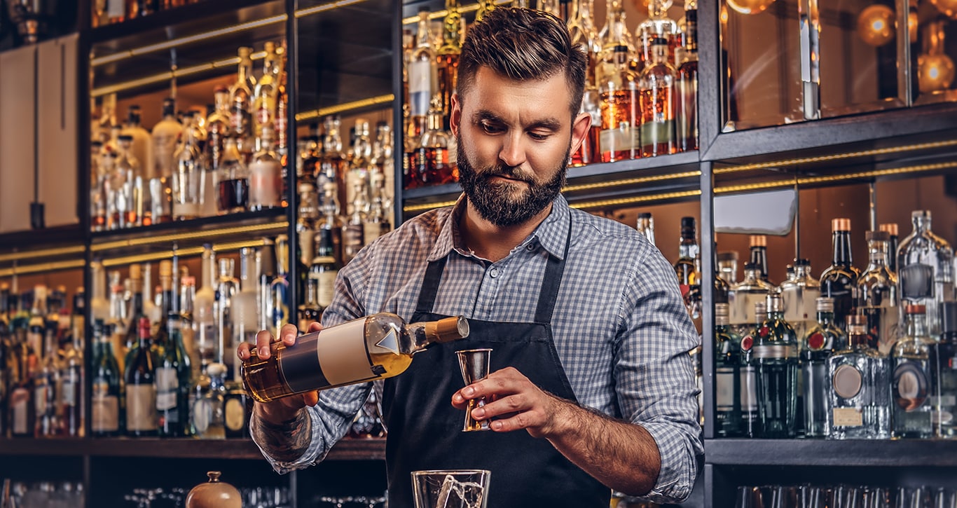 Chrysler Dodge Jeep Ram Dealer Near Brookville | Bartender pouring a shot in a glass