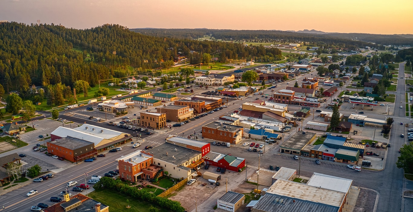 Chrysler Dodge Jeep Ram Dealer Near Clearfield | Overview of the city with buildings and hills
