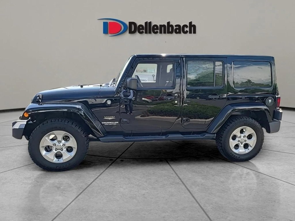 Used 2015 Jeep Wrangler Unlimited Sahara with VIN 1C4BJWEG9FL531087 for sale in Fort Collins, CO