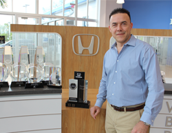 Staff member Earl Navarra from ID_1f84b4