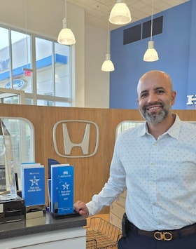 Staff member Ali Chames from ID_1f84b4