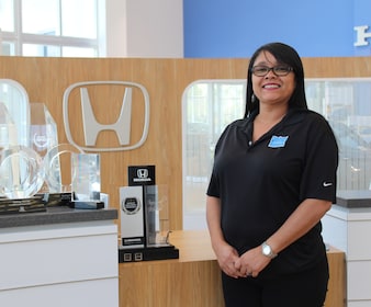 Staff member Lucy Conrado from ID_1f84b4