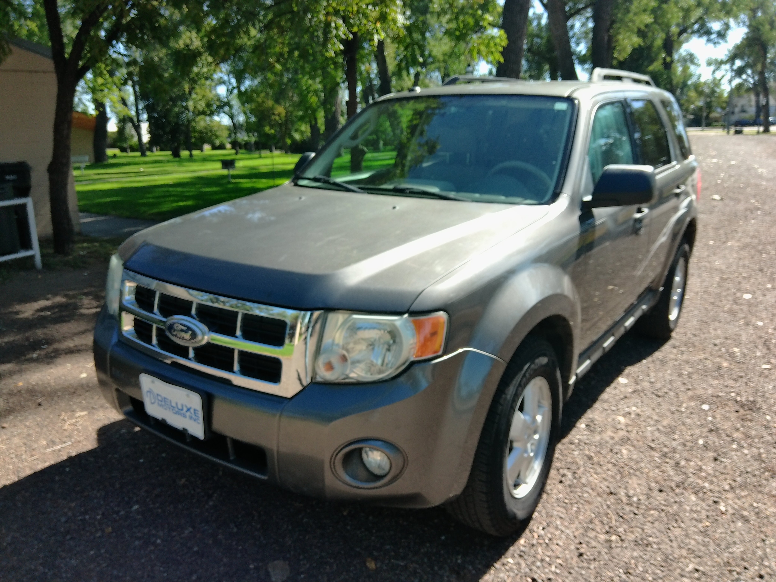 Used 2010 Ford Escape XLT with VIN 1FMCU9D71AKC42147 for sale in Miles City, MT