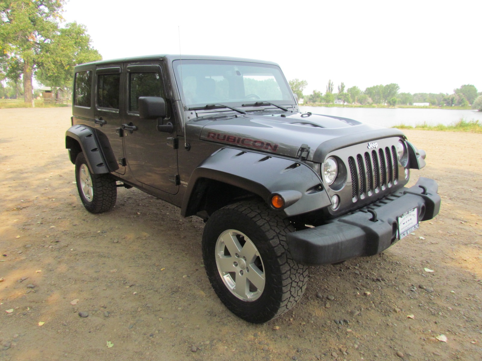 Used 2014 Jeep Wrangler Unlimited Sahara with VIN 1C4BJWEG0EL169603 for sale in Miles City, MT