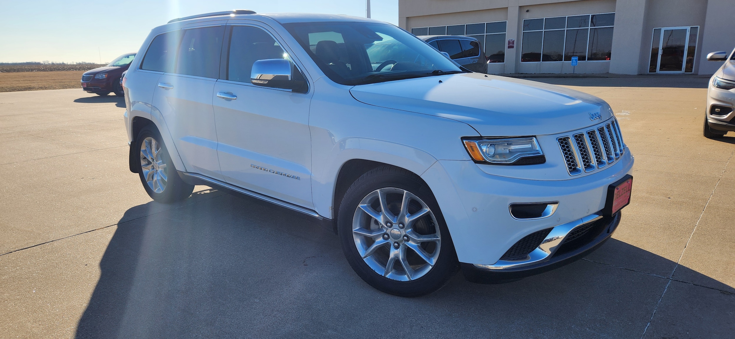 Used 2015 Jeep Grand Cherokee Summit with VIN 1C4RJFJG0FC606277 for sale in Wapello, IA