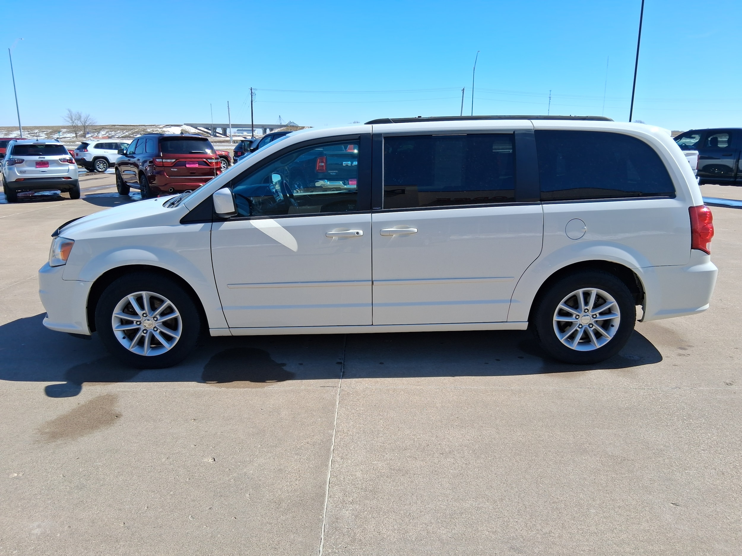 Used 2013 Dodge Grand Caravan SXT with VIN 2C4RDGCG4DR766094 for sale in Wapello, IA