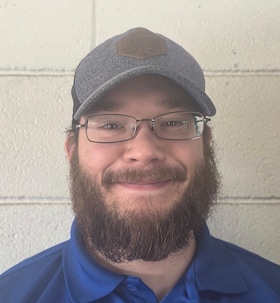 Staff member Zach Frohriep from 99e8ddcf382c