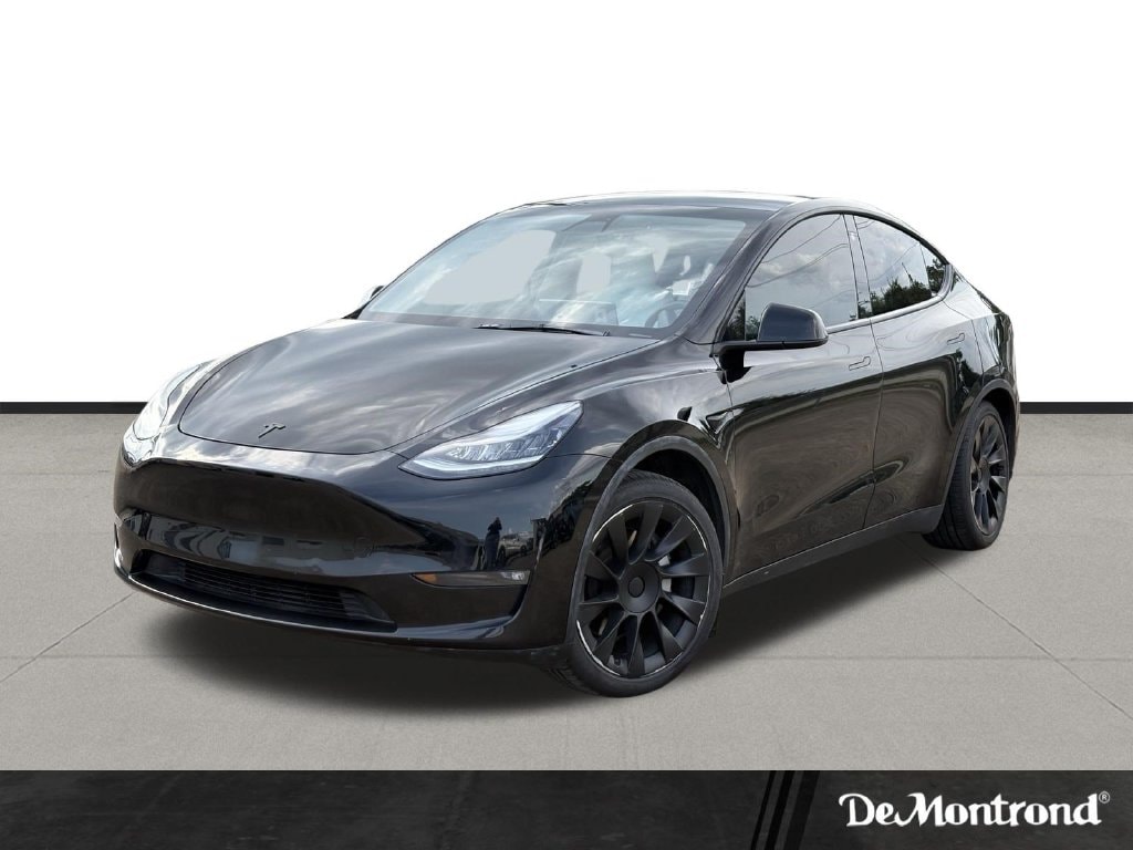 Used 2021 Tesla Model Y Standard Range with VIN 5YJYGDED9MF115236 for sale in Conroe, TX