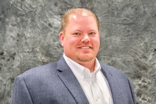 Staff member Derek Menholt from ID_9126a6