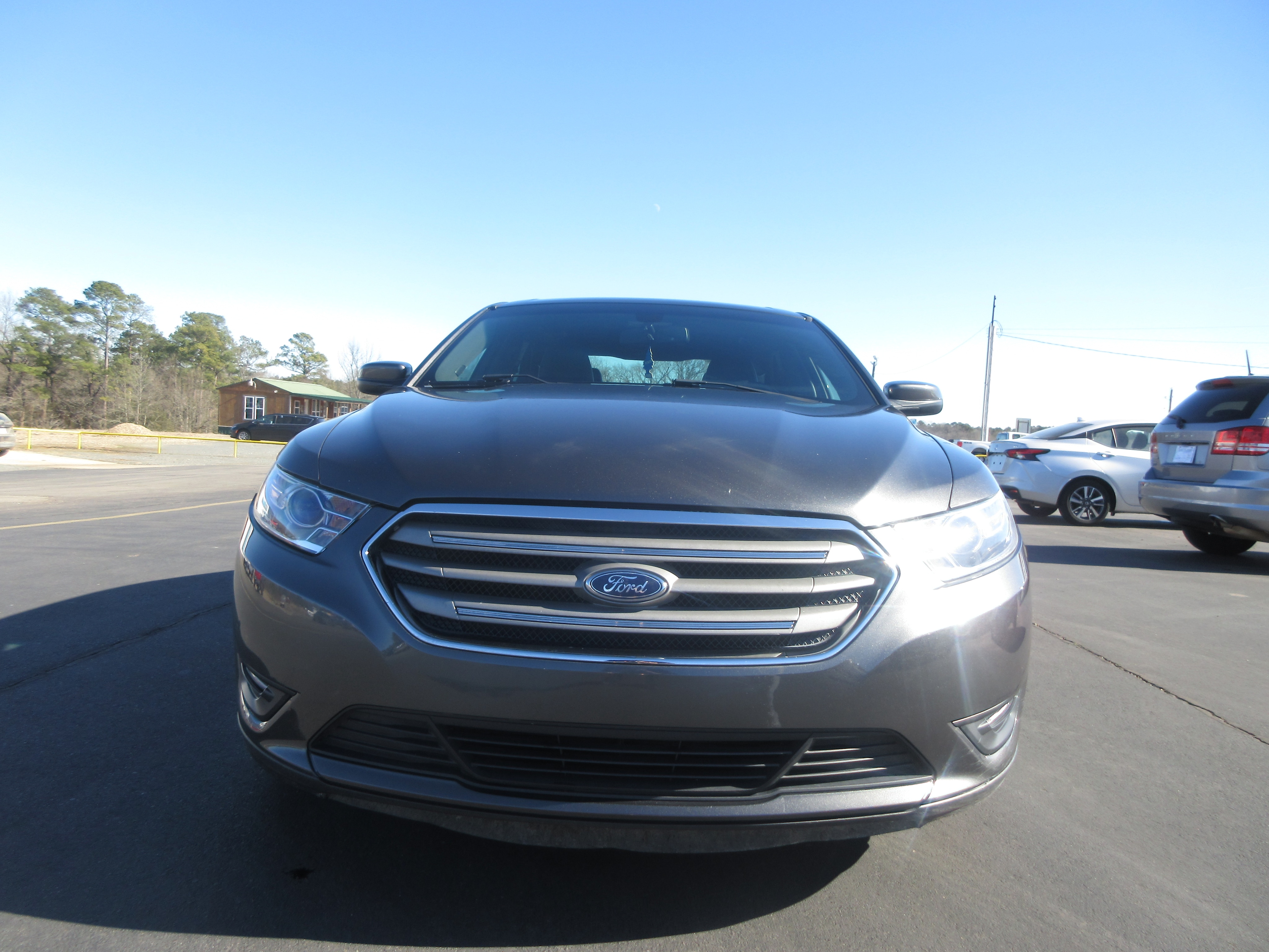 Used 2016 Ford Taurus SEL with VIN 1FAHP2E87GG131815 for sale in De Queen, AR
