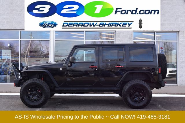 Used 2015 Jeep Wrangler Unlimited Sport with VIN 1C4BJWDG4FL561809 for sale in Montpelier, OH