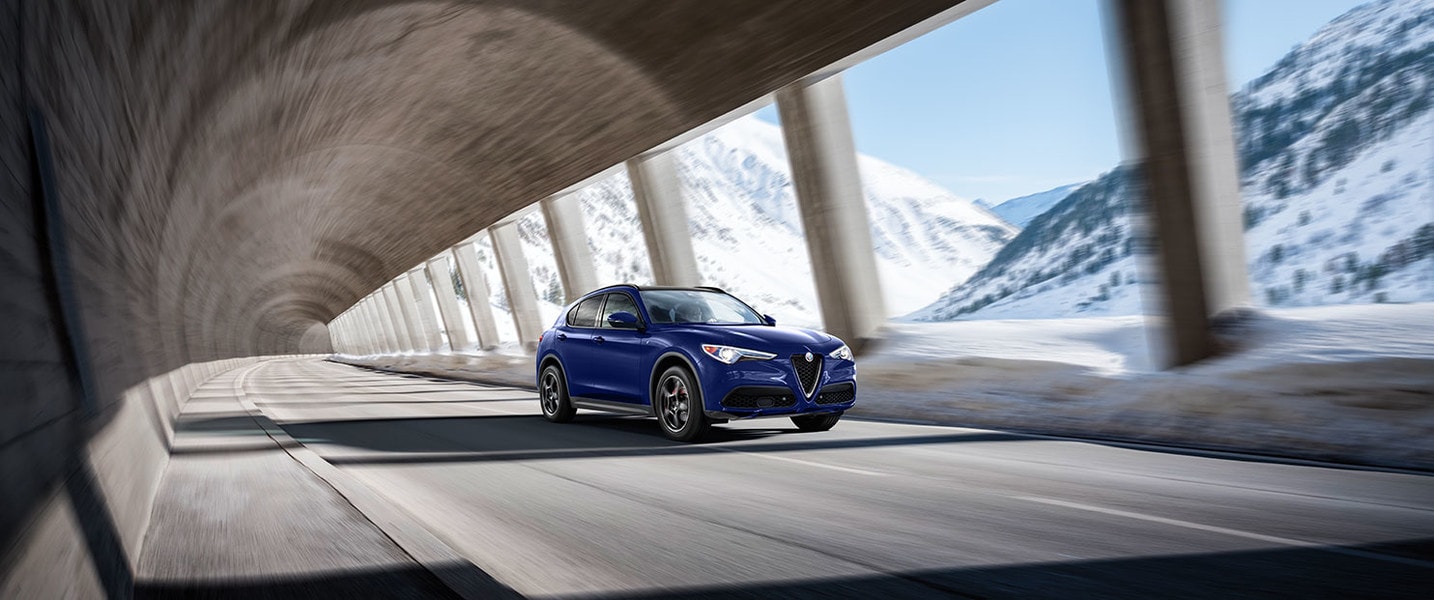 front side view of a 2023 Alfa Romeo Stelvio in a tunnel