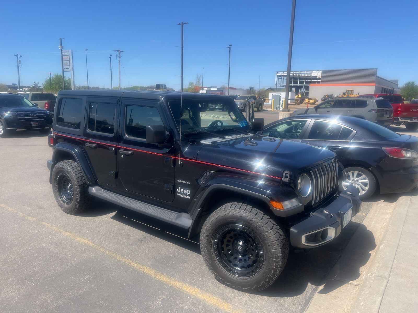 Used 2019 Jeep Wrangler Unlimited Sahara with VIN 1C4HJXEG5KW684624 for sale in Detroit Lakes, Minnesota