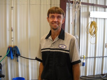 Staff member John Marks from ID_213607