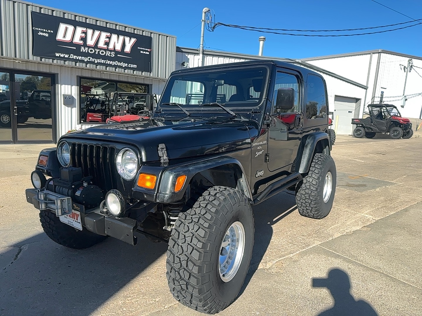 Used 2000 Jeep Wrangler SPORT with VIN 1J4FA49S0YP704649 for sale in McCook, NE