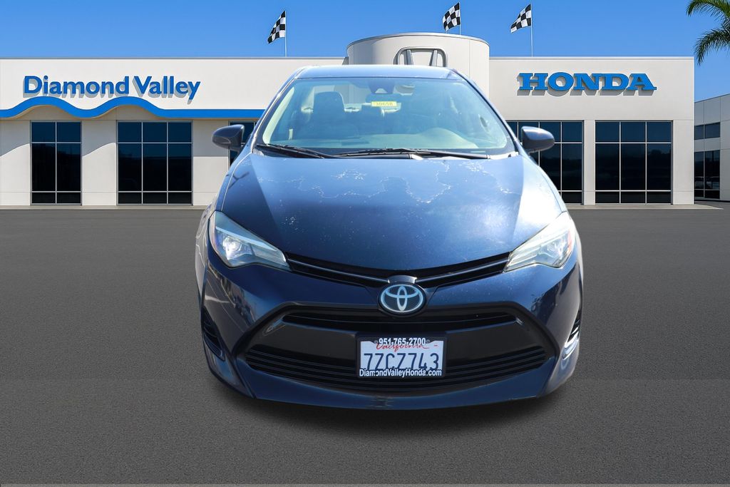 Used 2017 Toyota Corolla LE with VIN 5YFBURHE9HP717080 for sale in Hemet, CA