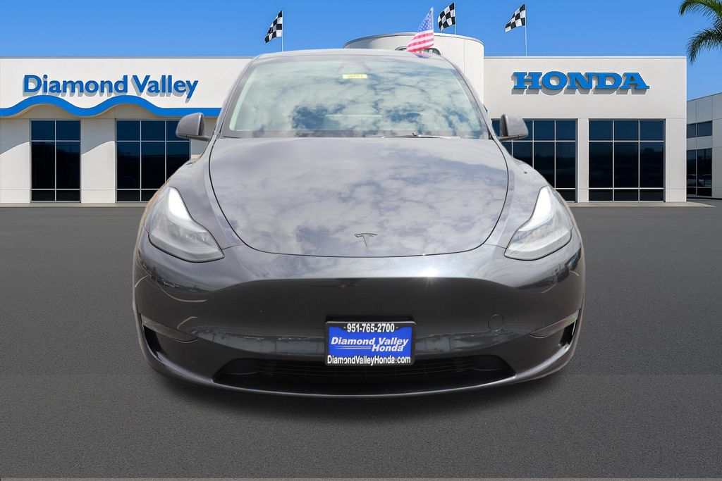 Used 2024 Tesla Model Y Long Range with VIN 7SAYGDED9RF097735 for sale in Hemet, CA