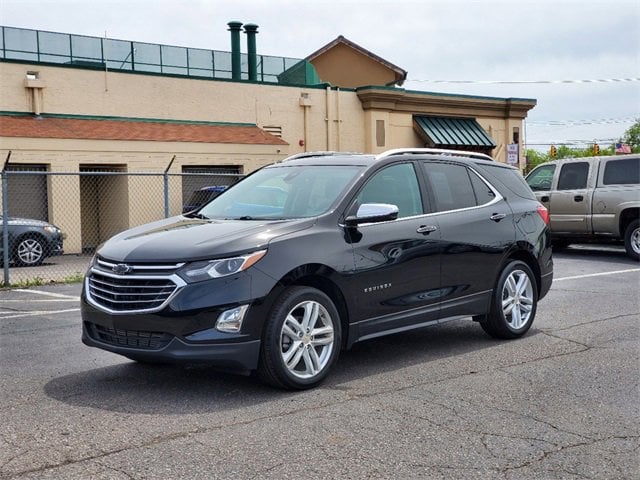 Used 2021 Chevrolet Equinox Premier with VIN 2GNAXNEV9M6114486 for sale in Southgate, MI