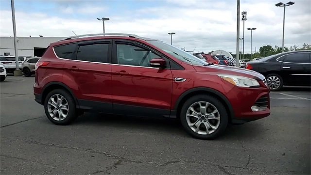 Used 2016 Ford Escape Titanium with VIN 1FMCU9JXXGUA74686 for sale in Southgate, MI