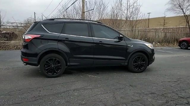 Used 2018 Ford Escape SE with VIN 1FMCU0GD1JUC85694 for sale in Southgate, MI