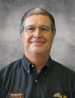 Staff member Enrique Solis from 4218fc375245