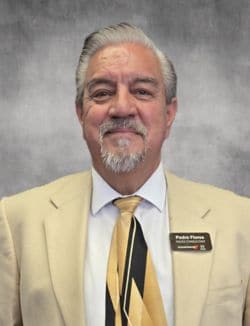 Staff member Pedro Flores from 4218fc375245