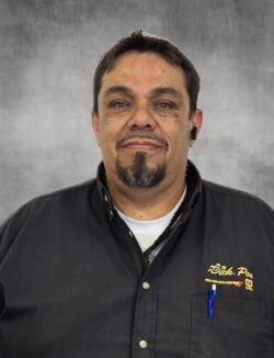 Staff member Adrian Martinez from 7291a8f24304